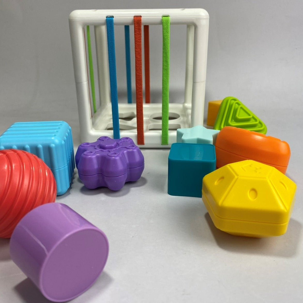 shape-sorting-toy-with-elastic-band-sensory-bin-hoshi-baby-philippines